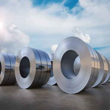 Steel coils stacked in a factory